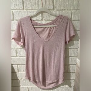 Lululemon V-neck athletic top.